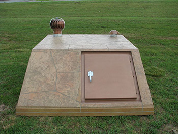 Slope Front Storm Shelters